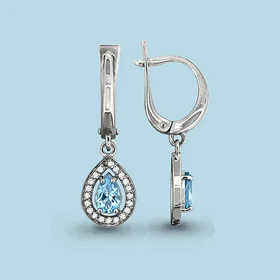 4410202А Серьги из Серебра с топазами скай блю, фианитами