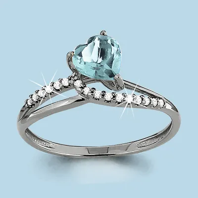 6519102А Кольцо из Серебра с топазом скай блю, фианитами
