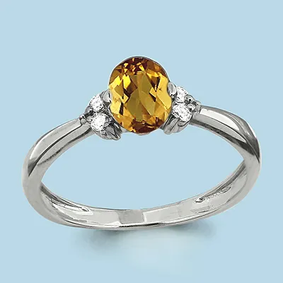 6523606А Кольцо из Серебра с фианитами, цитрином